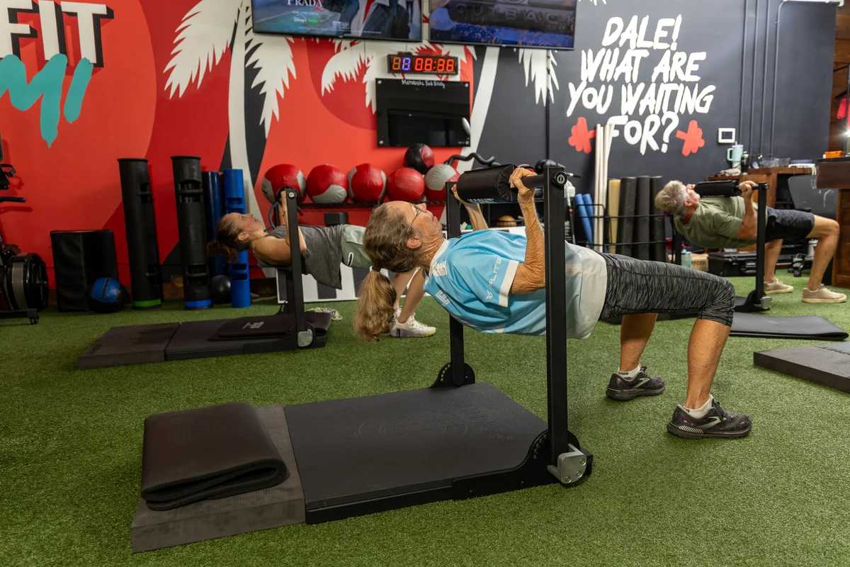ISOPHIT Strength Training for Adults 50+ Adults 50+ practicing controlled strength exercises on ISOPHIT equipment