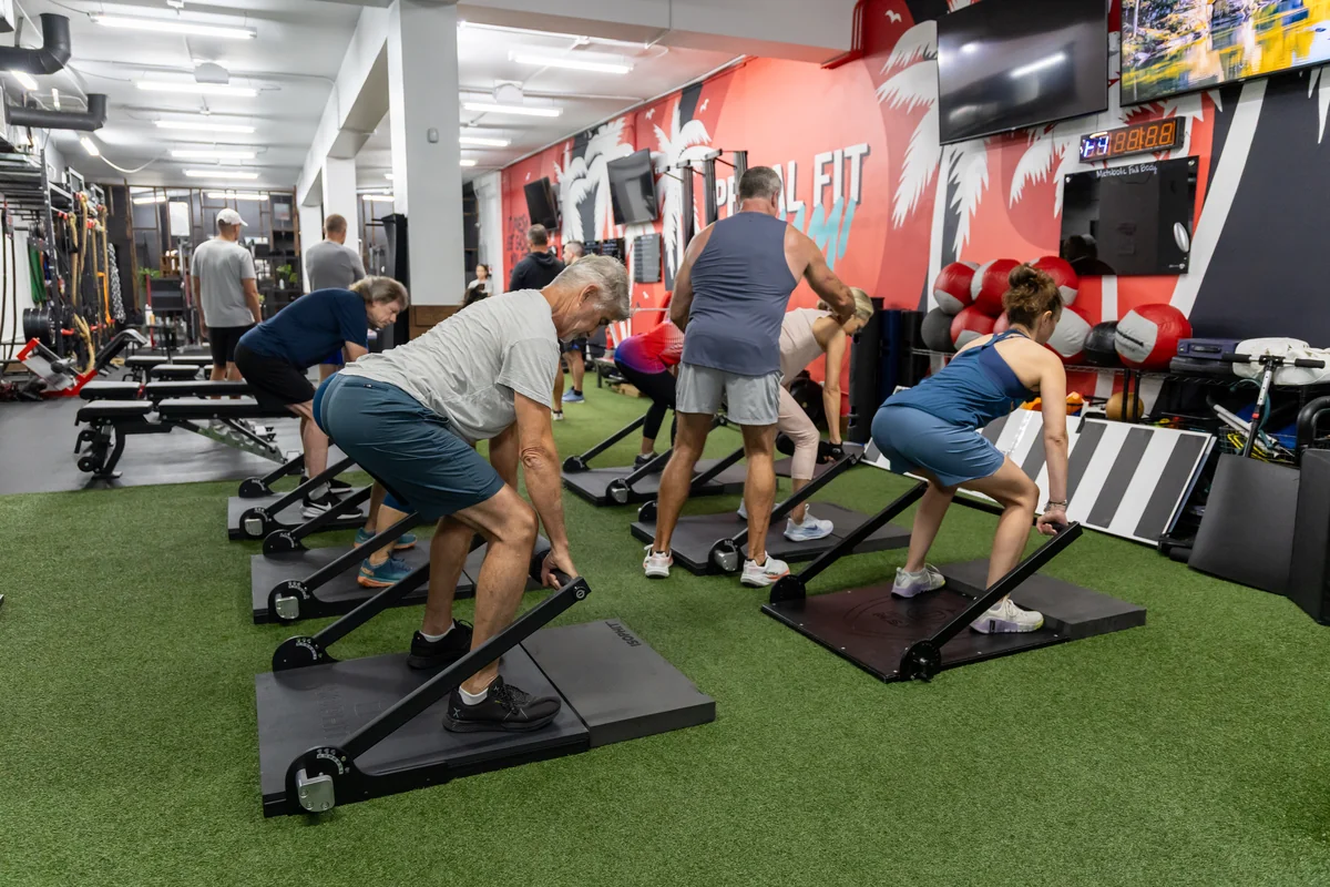 Prime Strength 30 Small Group Training Small group completing coached ISOPHIT exercises during Prime Strength 30